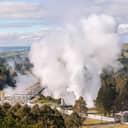 aerial view of the Wairakei Geothermal Power Station with steam rising from it