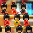 Japanese wooden kokeshi dolls in Kimono suit