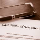 Last Will and Testament document with a pen on top