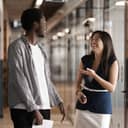 Two people socializing at work