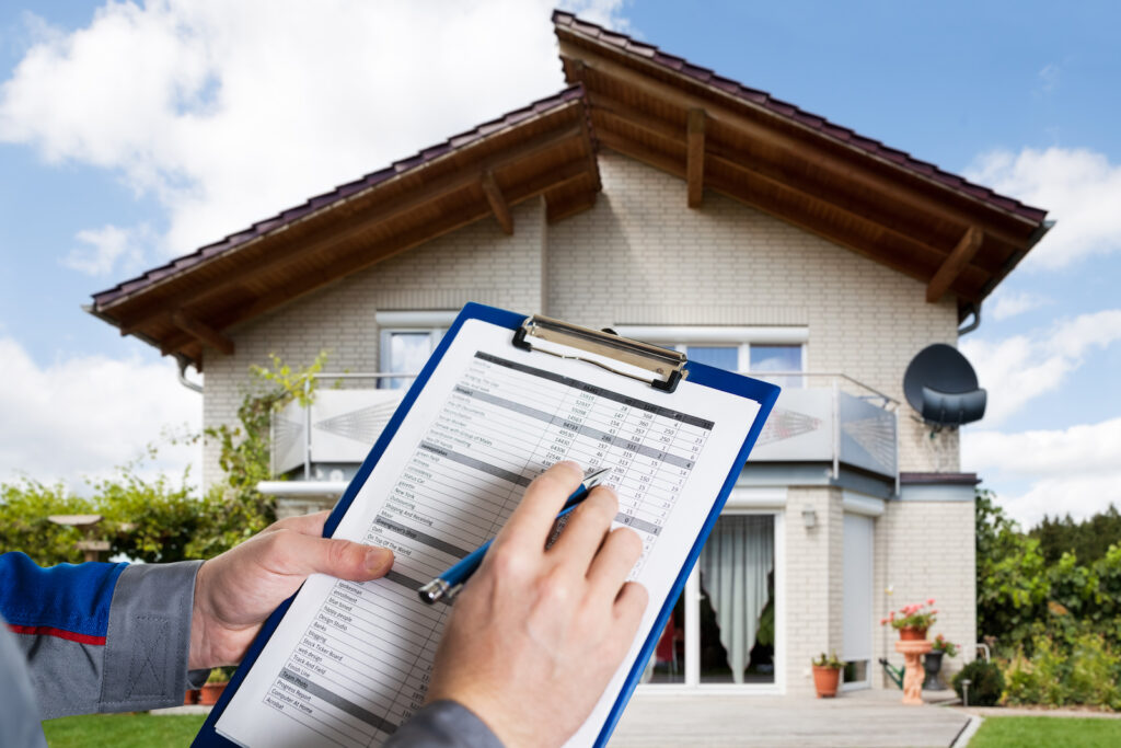 An inspector checking the value of a house